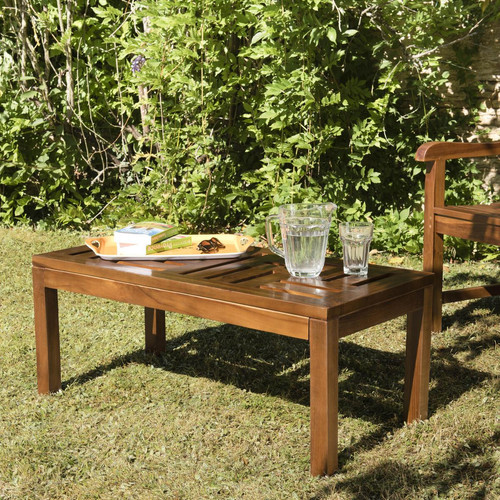 Macabane - Table basse de jardin HANNA -  100 x 50 cm en bois teck huilé - Le jardin